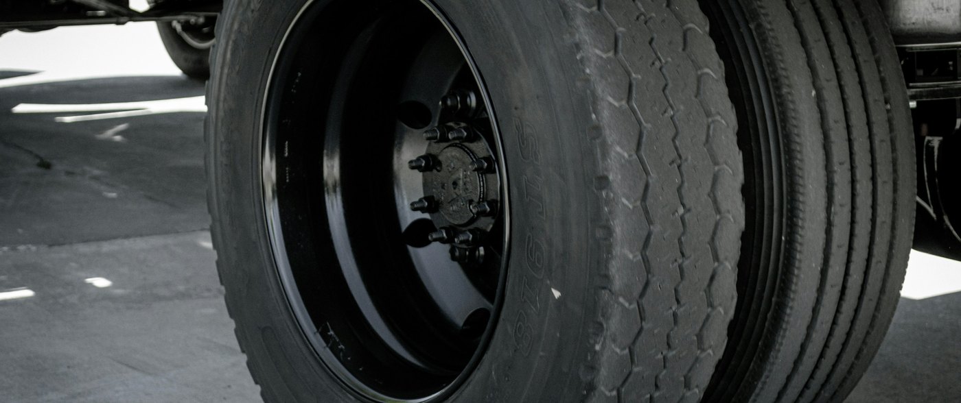 Close view of the dual rear tires on a heavy truck