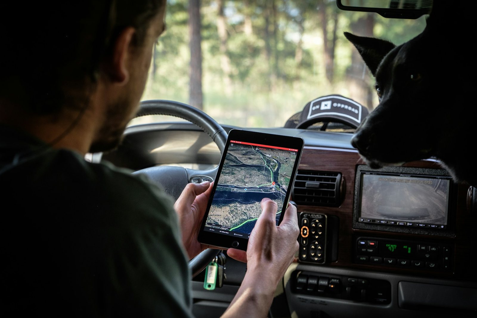 A driver checking the route from the cab
