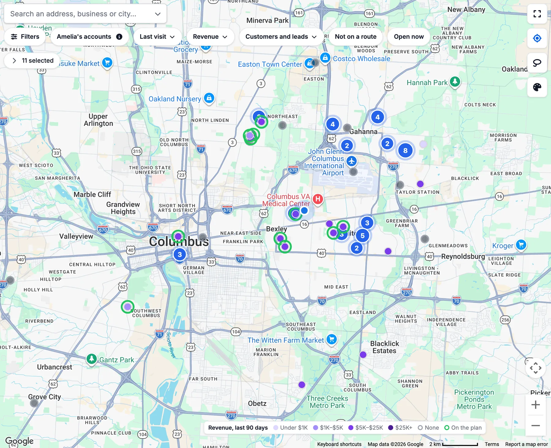 Workd's territory map around Columbus, every account colored by revenue, the planned stops ringed in green